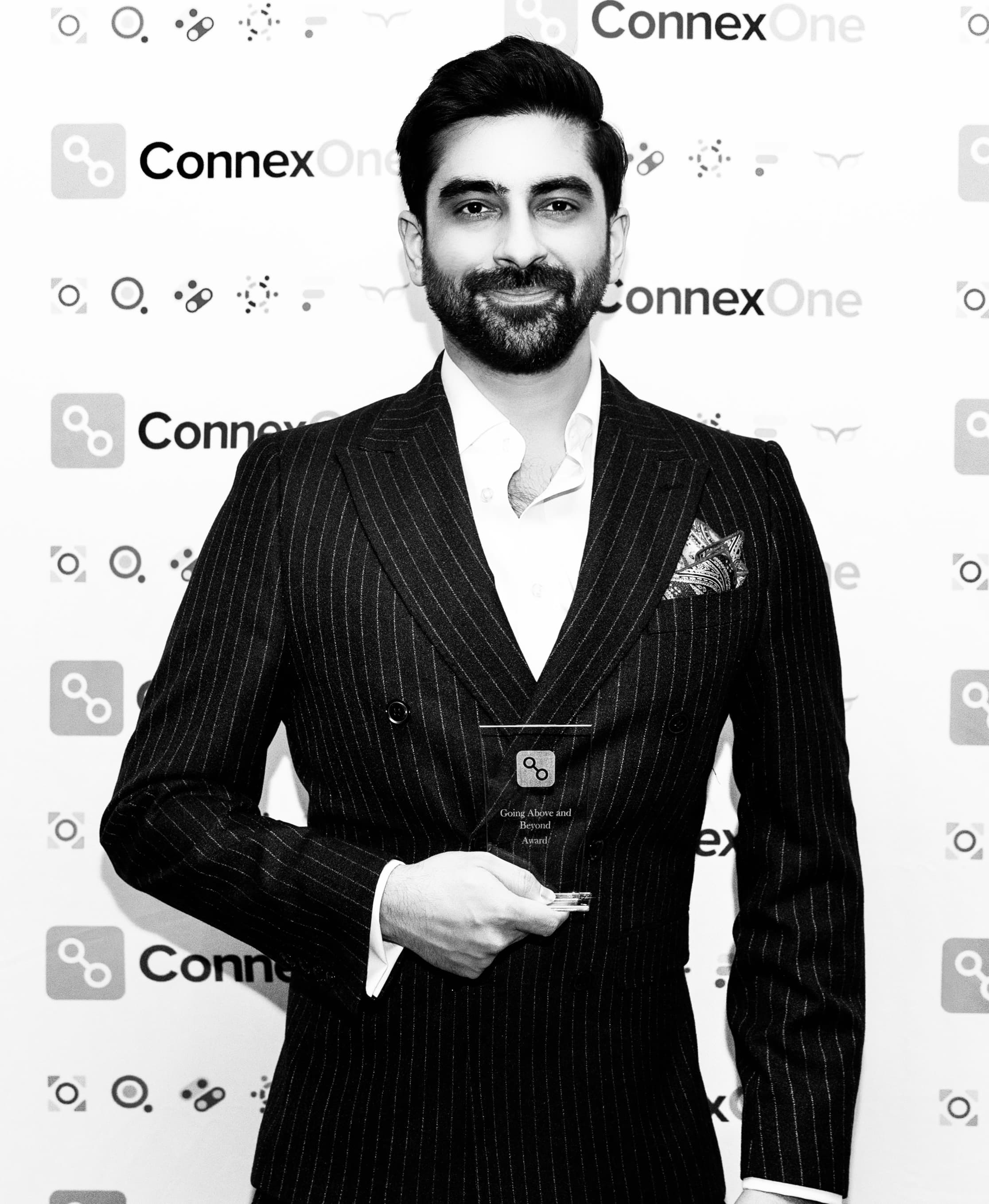 Annup Raj Kapur receiving an award.
